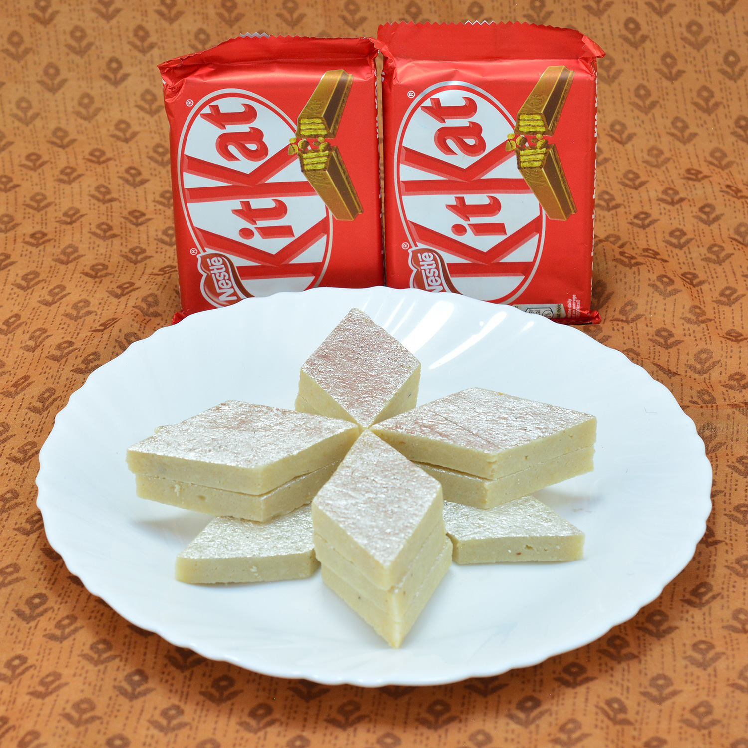Mouthwatering Kaju Katli with Finger Licking Nestle Kitkat Hamper