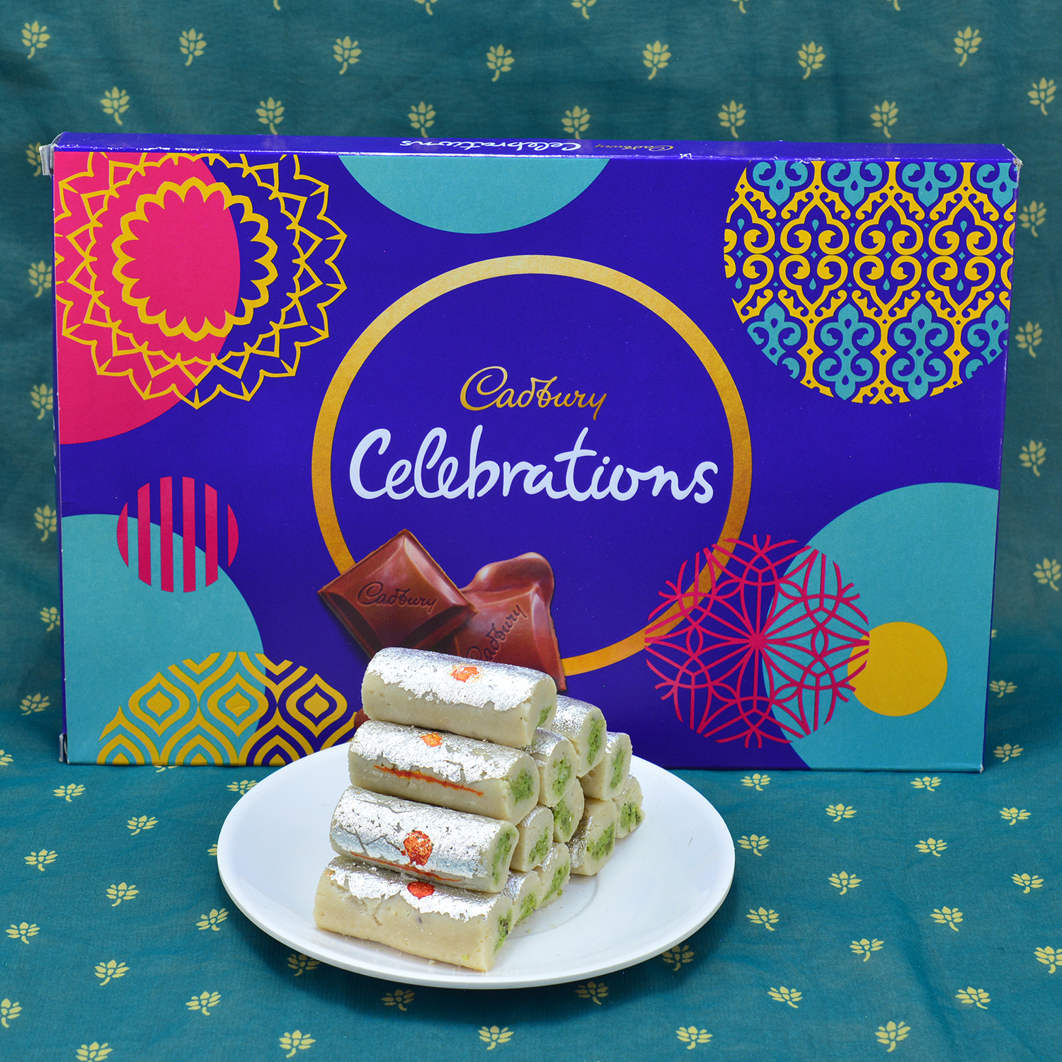 Captivating Kaju Roll with Delicious Cadbury Celebrations Hamper