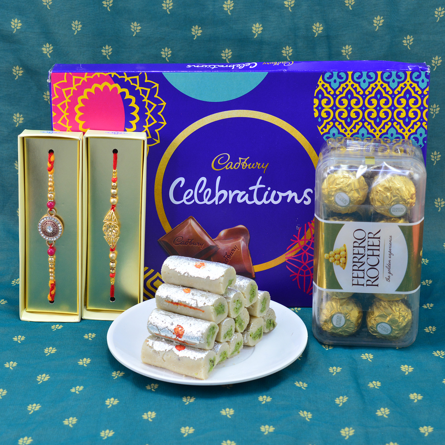 Eye Catching 2 Jewel Rakhi with Delicious Kaju Roll with savory Cadbury Celebrations and Ferrero Rocher