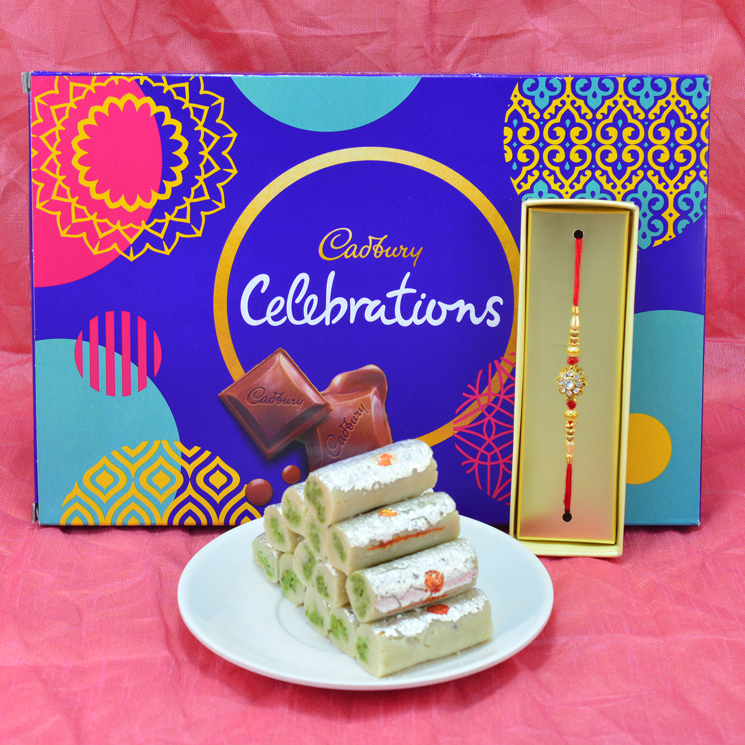 Spectacular Diamond Jewel Rakhi with Delicious Cadbury Celebrations and dainty Kaju Roll