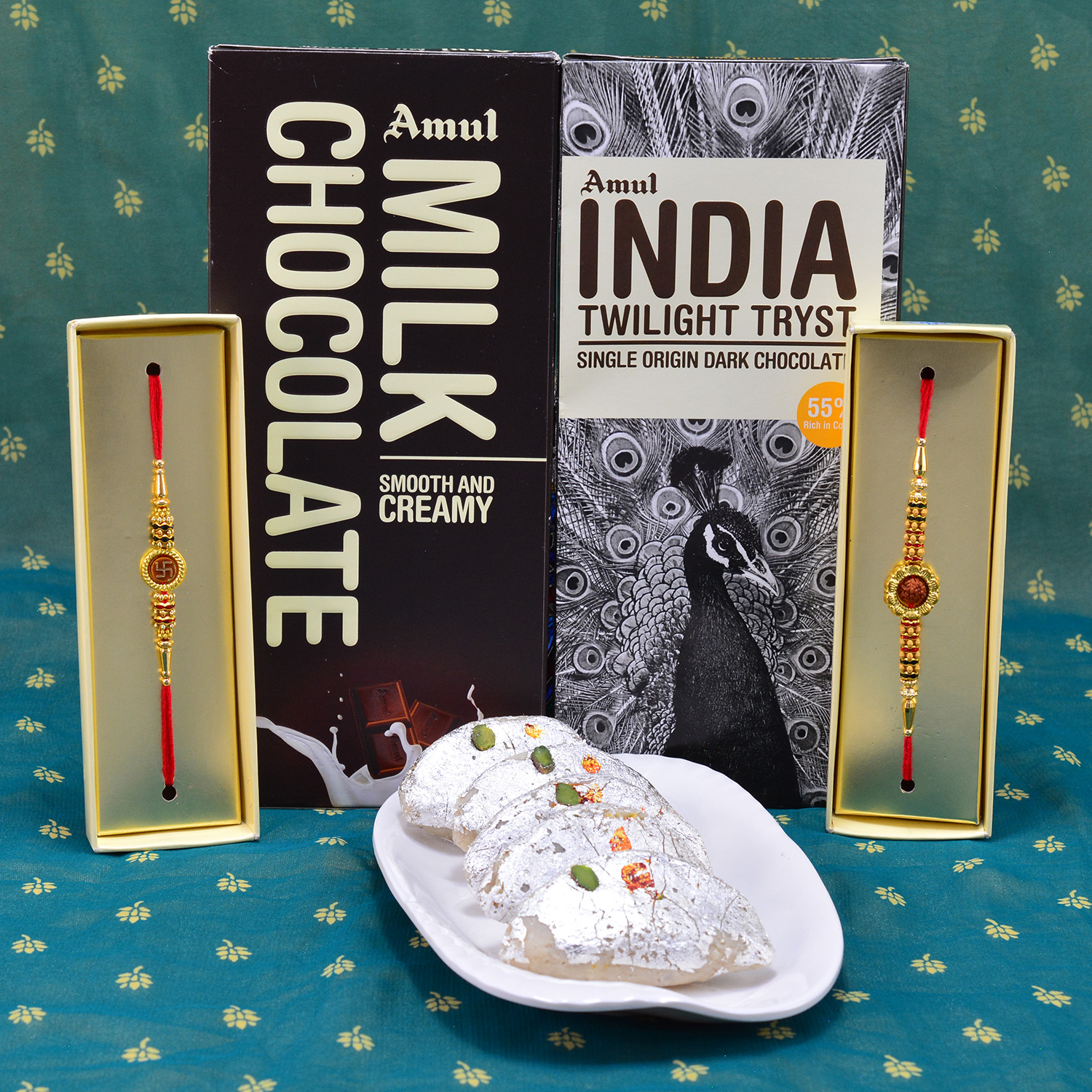 Gorgeous Divine Rakhi with Delicious Amul Mil Chocolate and Luscious Kaju Gujia Hamper