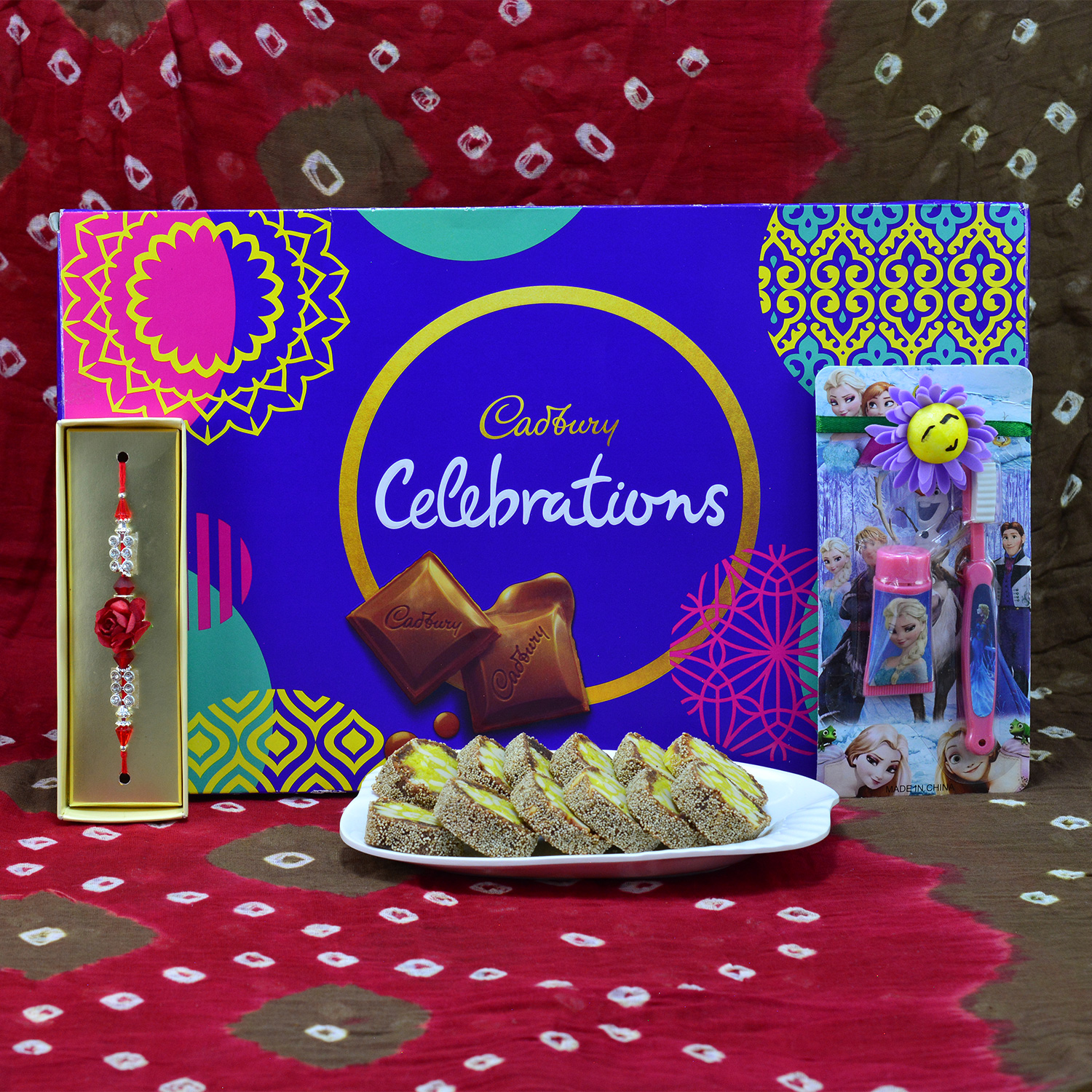 Stunning Flower Design Beads and Cartoon Kids Rakhi wtih Luscious Anjeer Chakra with Cadbury Celebrations