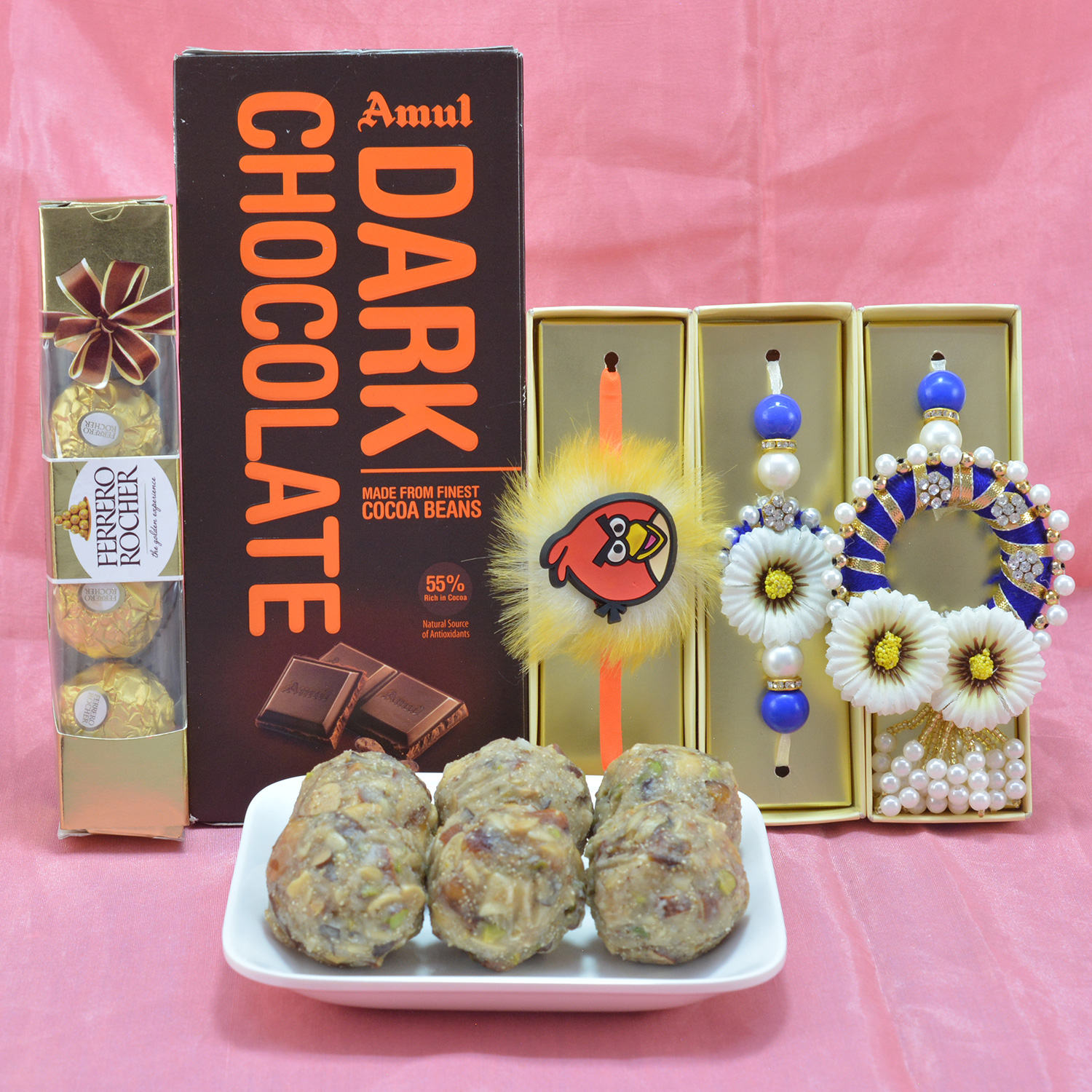 Marvellous Eye Catching Pearl Stud Flower Design Bhaiya Bhabhi Rakhi with Angry Bird Kids Rakhi along with Delicious Mix Dry Fruit and Yummy Amul Dark Chocolate Hamper