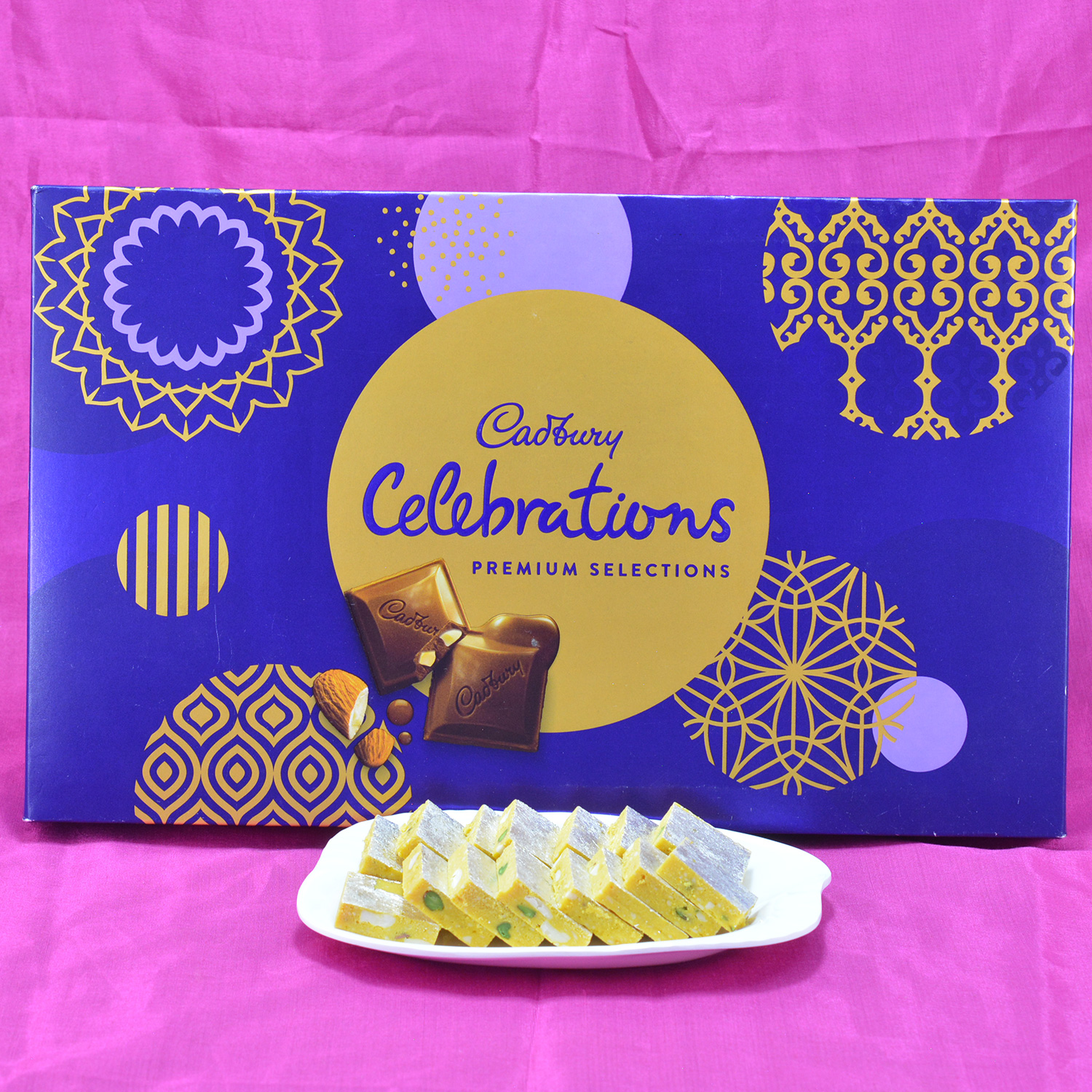 Piquant Kaju Kesar Pista Barfi with Mouthwatering Cadbury Celebrations Hamper