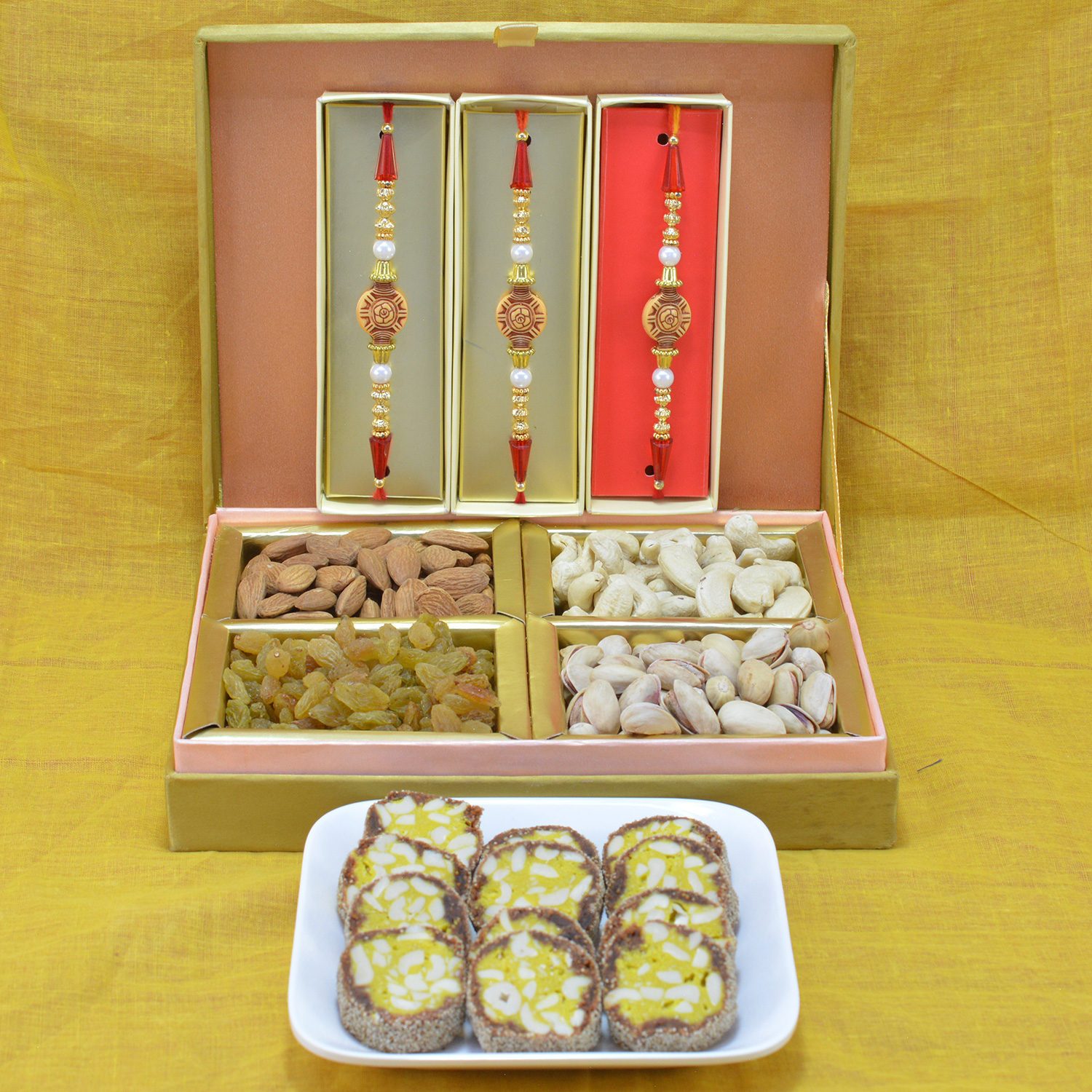Magnificent Multicolor Rakhi with Tasty Mix Dry Fruit along with Delicious Kaju Anjeer Barfi Hamper