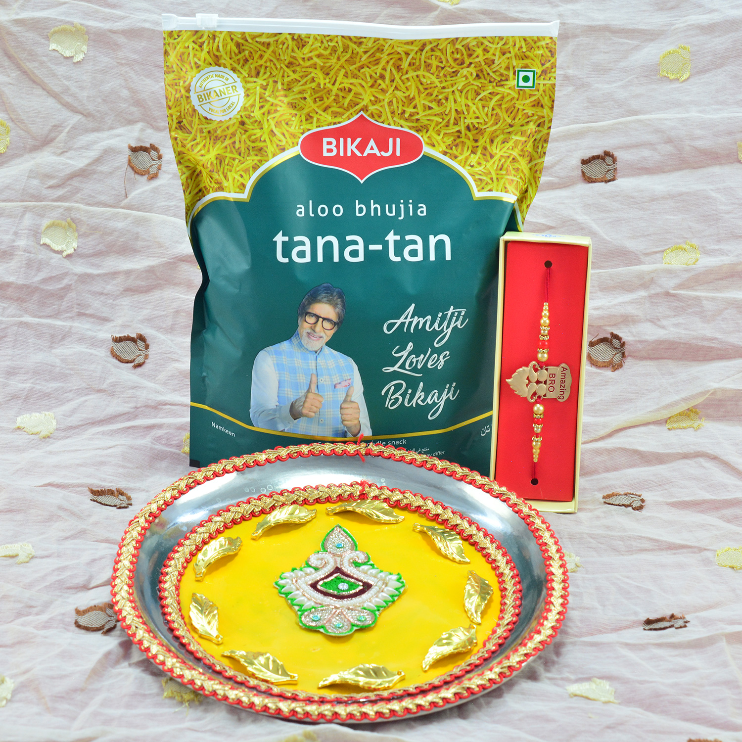 Bikaji Aloo Bhujia Tana Tan Delicious Namkeen with Kalsha Shape Design On Yellow Base Rakhi Pooja Thali