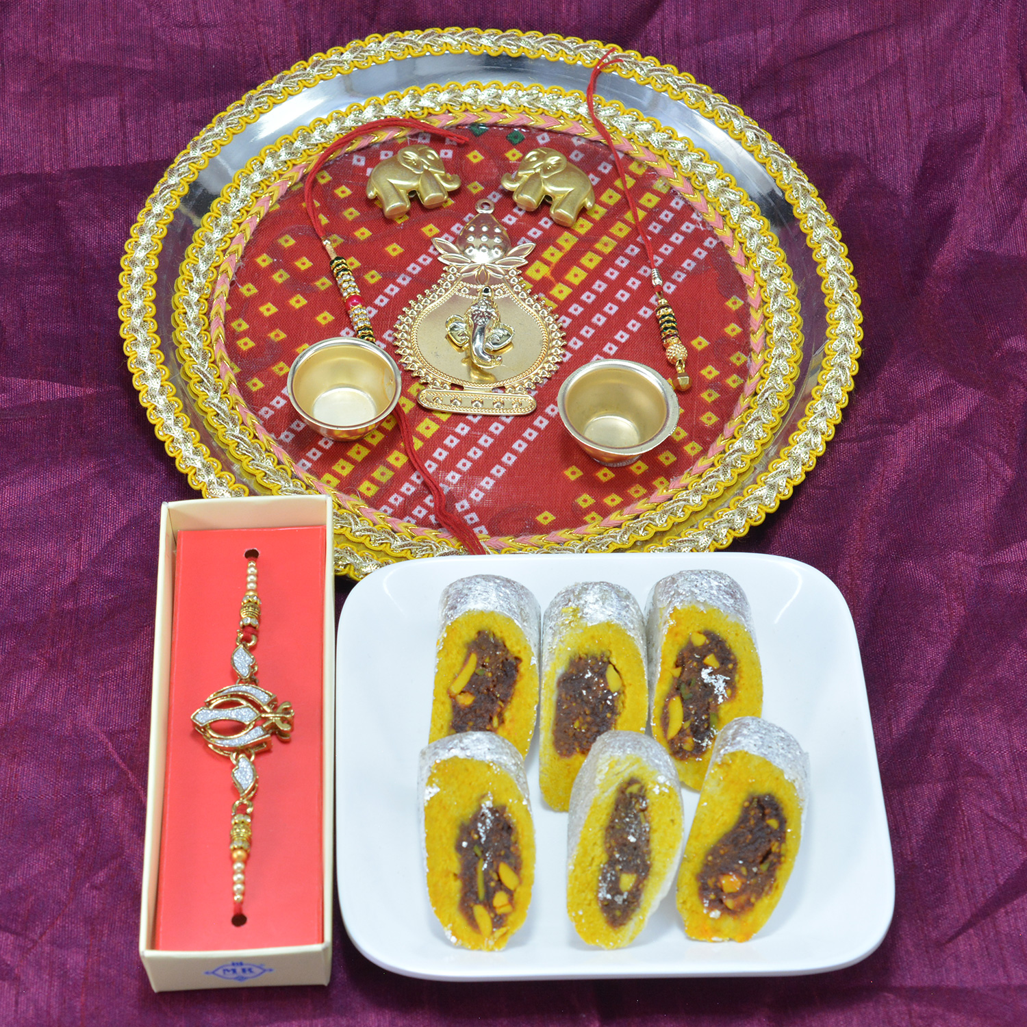 Gorgeous Ganesha Traditional Pooja Thali with Delicious Kaju Rajbahar Hamper