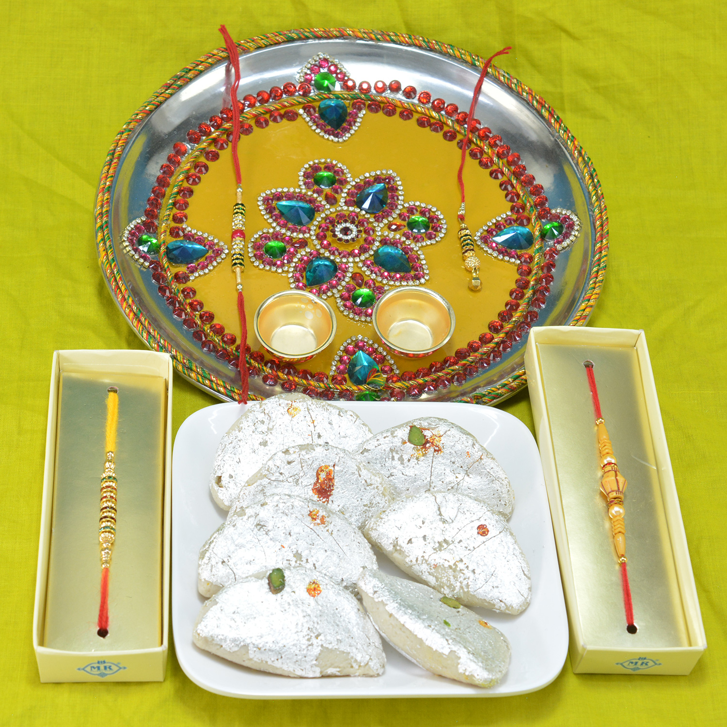 Gorgeous Crafted Pooja Thali along with Savory Kaju Gujia and Rakhi Hamper
