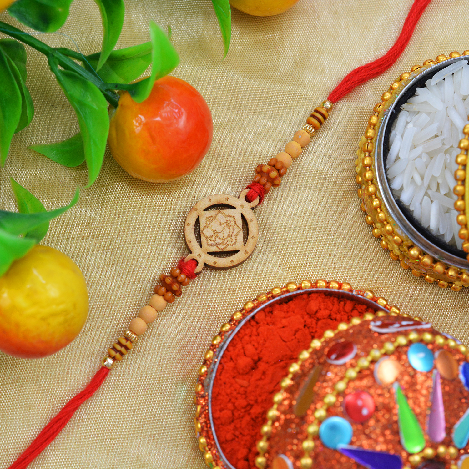 Stylish Sandalwood Ganesh Rakhi with Graceful Beads along with Silky Thread