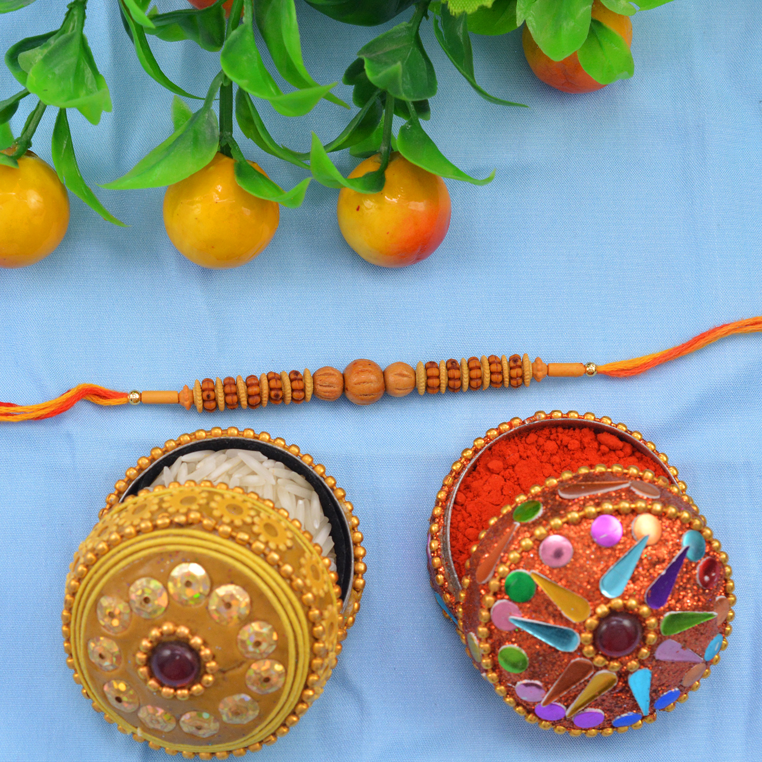 Scrumptious Sandalwood Rakhi with Multi-Color Silk Thread
