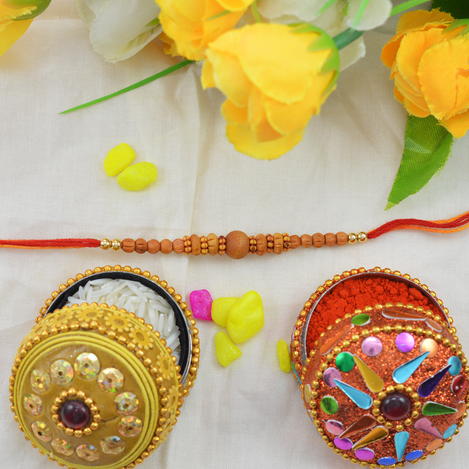 Lovely Sandalwood Rakhi with Graceful Pretty Beads