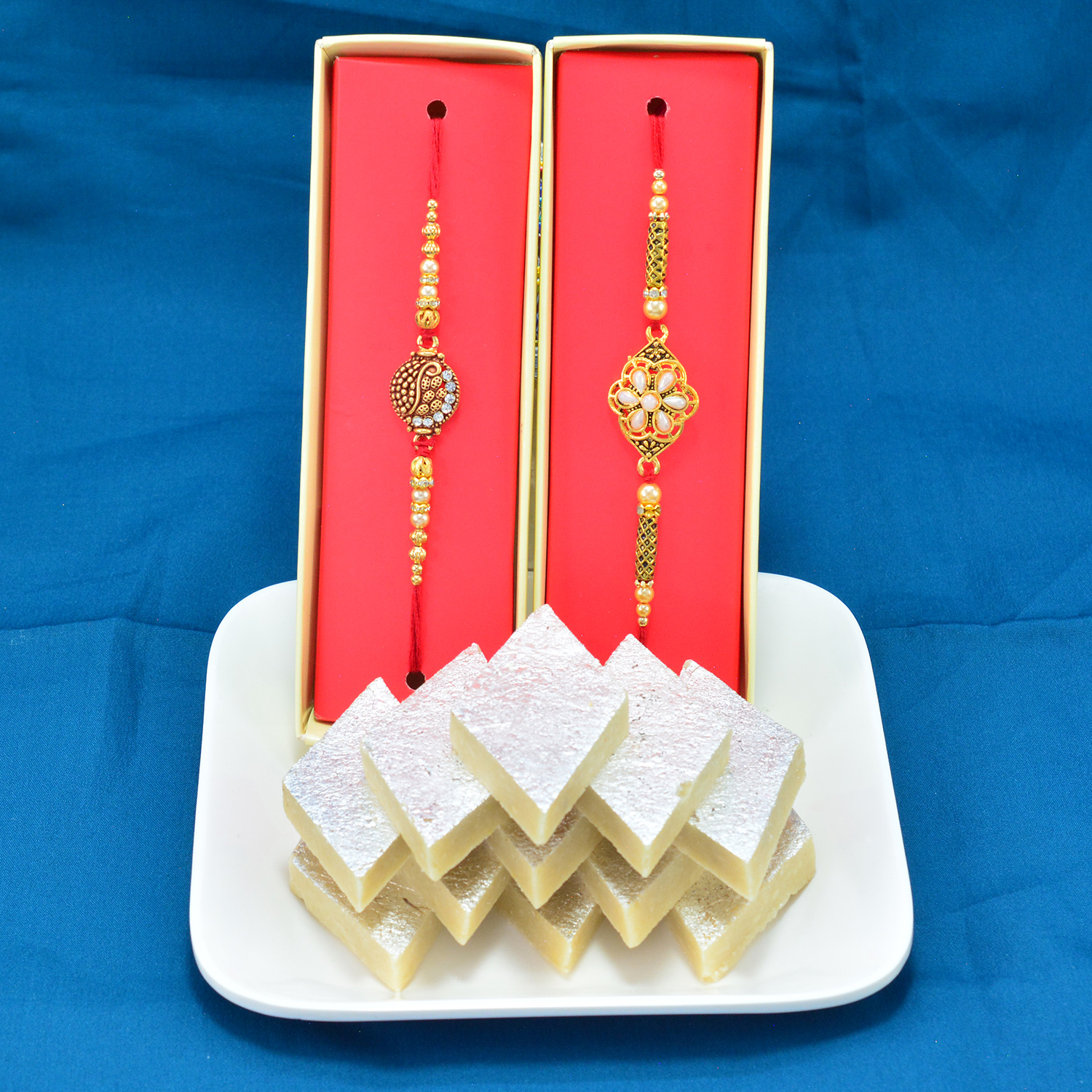 Sapid Kaju Katli with Eye Catching Golden Beads Fancy Rakhi