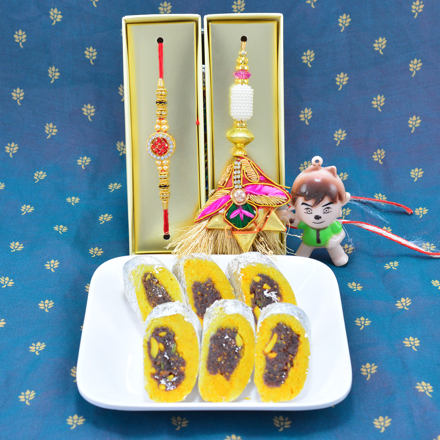 Bhaiya Bhabhi and Kid Toy Rakhi Set with Delicious Mouth Watering Kaju Raj Bahar Sweet