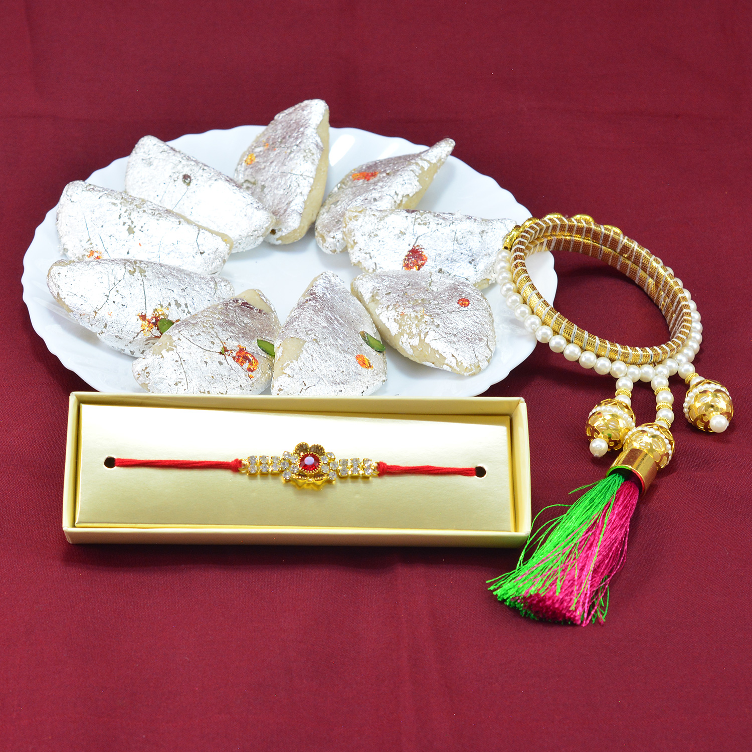 New Design Unique Collection of Rakhis for Brother and Bhabhi with Pure Kaju Gujia Sweet