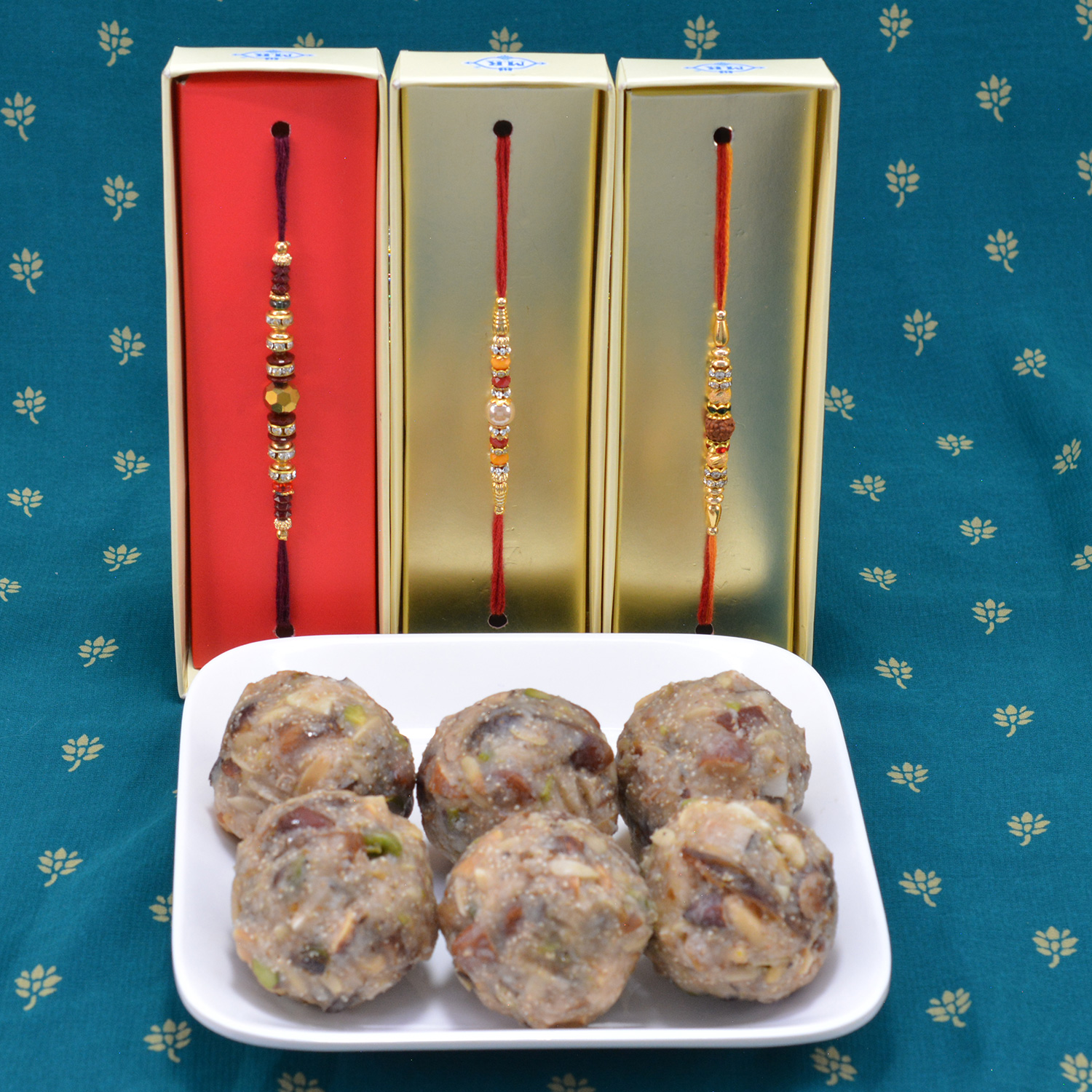 3 Magnificent Looking Rakhis for Brother along with Sweet of Best Dry Fruits Laddu