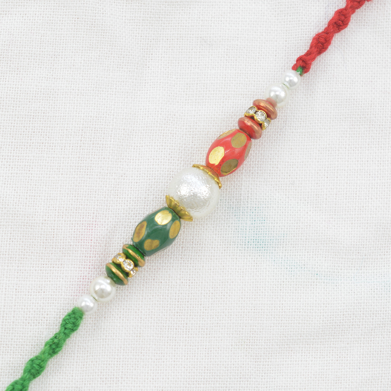 Center Base Pearl and Beads Rakhi in Red String