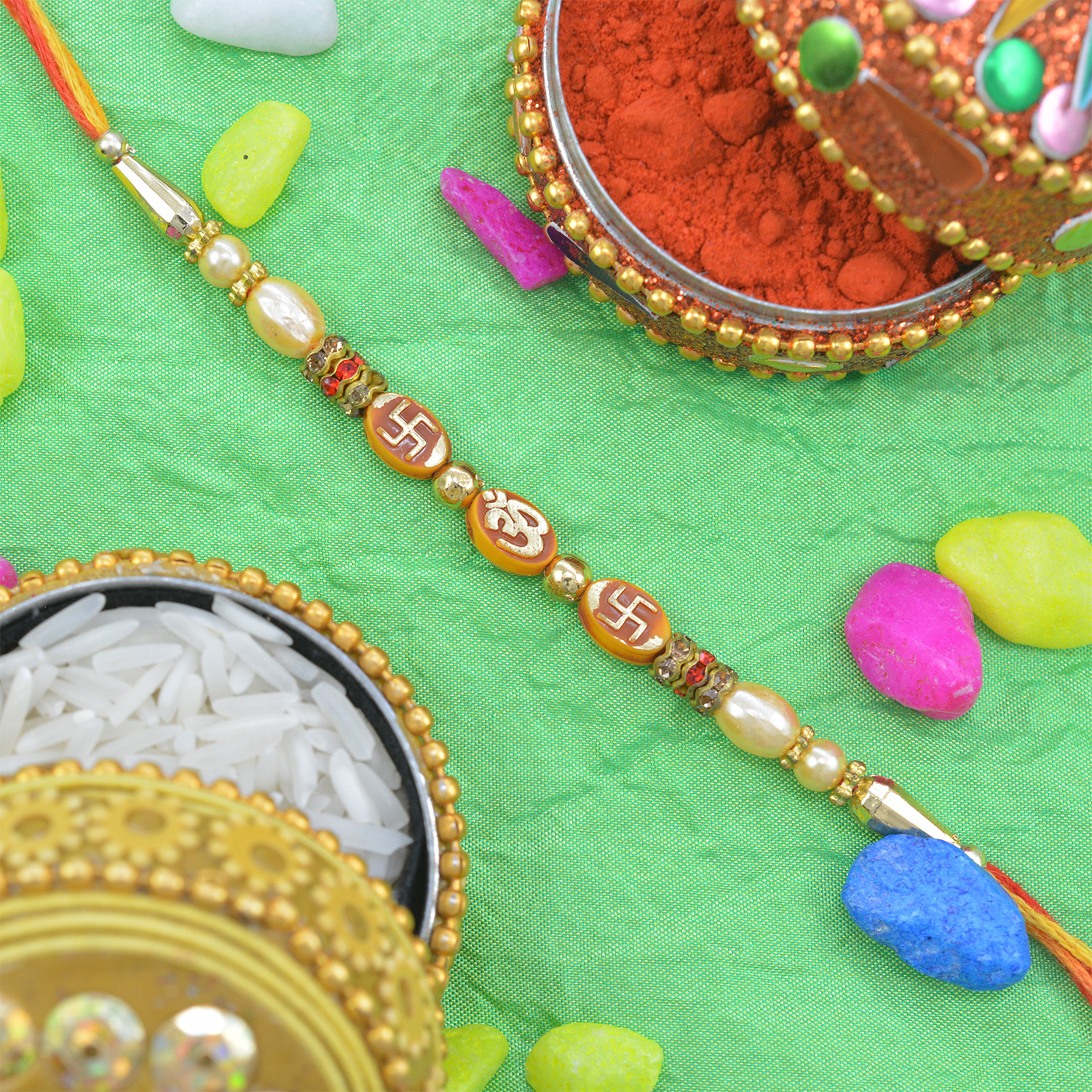 Magnificent Om and Swastik Rakhi with Pearls