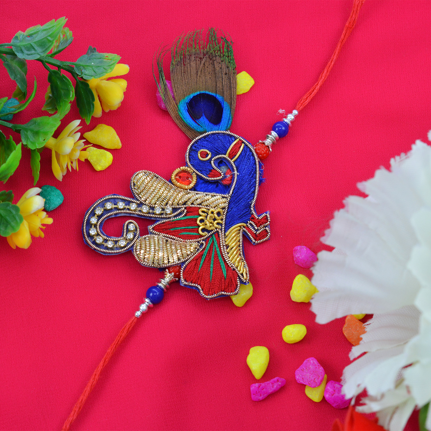 Delectable Peacock Zardosi Rakhi with Attractive Beads 
