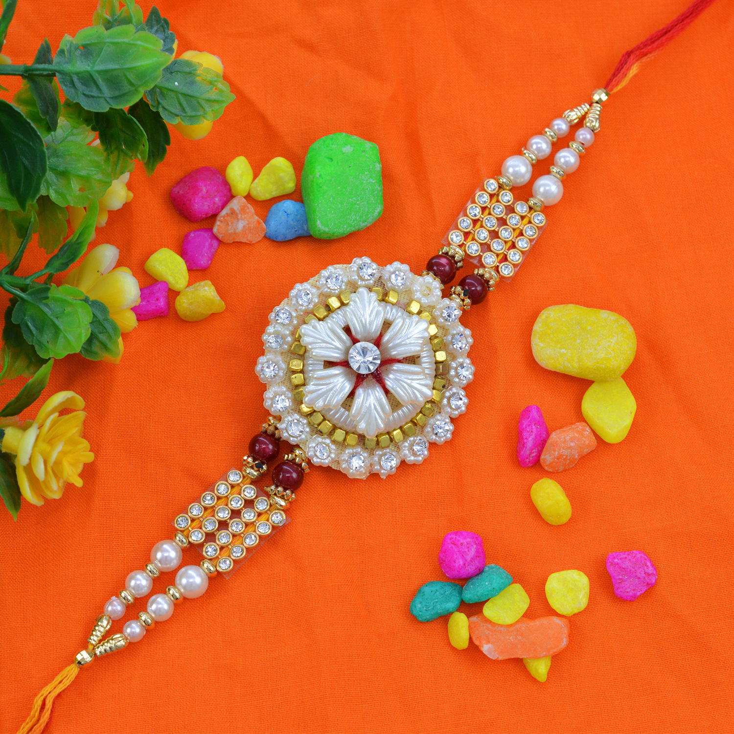 Trendy Red and White Pearl Combination with Graceful Zardosi Rakhi