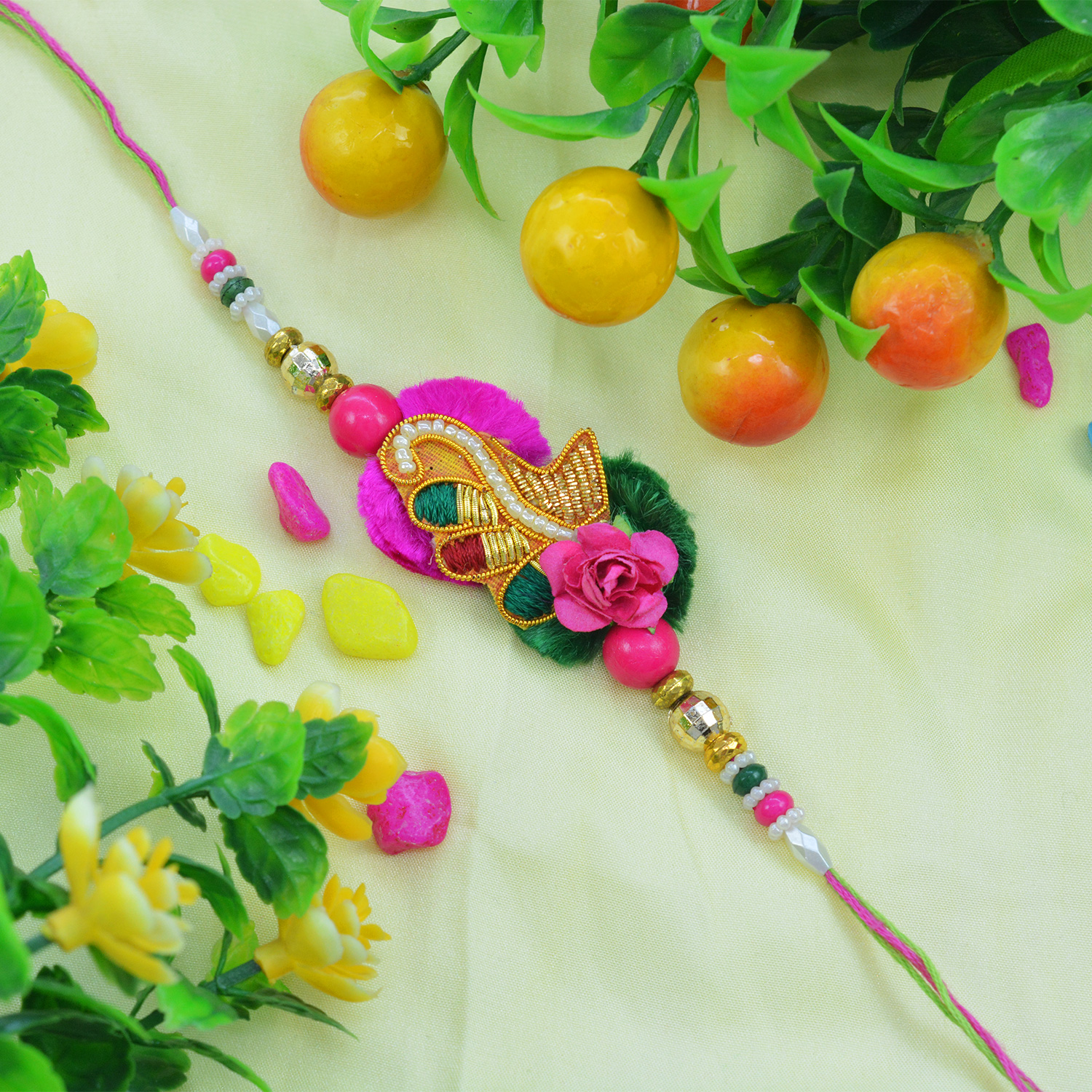 Amazing Flower and Colorful Pearls with Rich Looking Zardozi Rakhi