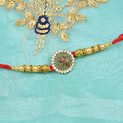Auspicious Swastik Rakhi with Diamonds and Pearls