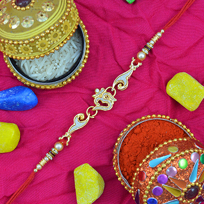 Glittery Om Rakhi with Pearls