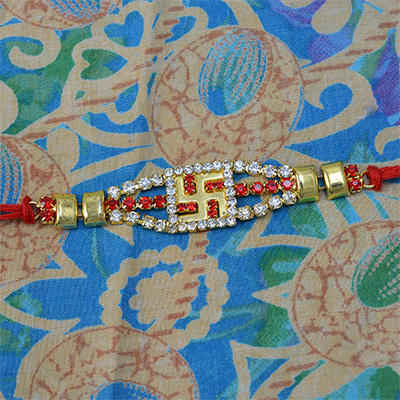 Golden Swastik with Red and White Diamonds