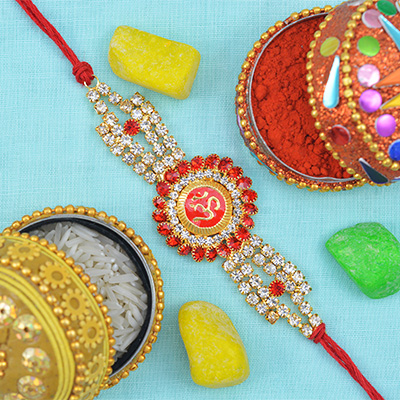 Round Shape Om Rakhi with Multicolor Diamonds