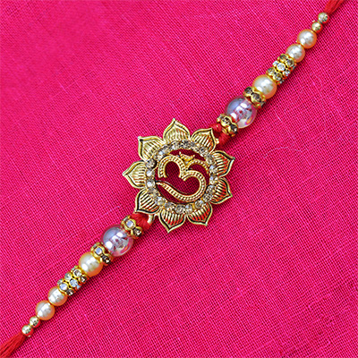 Floral Shape Om Rakhi with Glass work Pearls