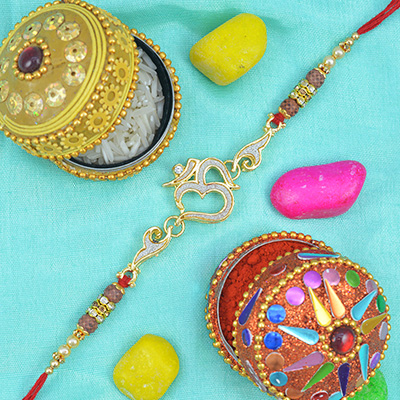 Designer Om rakhi with Beads and Diamonds