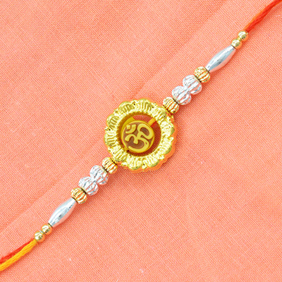 Golden Rakhi With Inner Om And White Beads