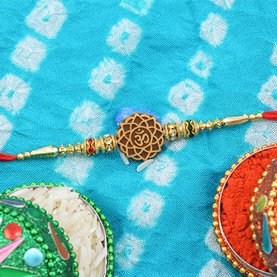 Round Shape Designer Om Rakhi in Multicolor Beads