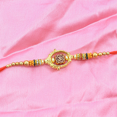 Golden work Om Rakhi in Multicolor Beads and Pearls
