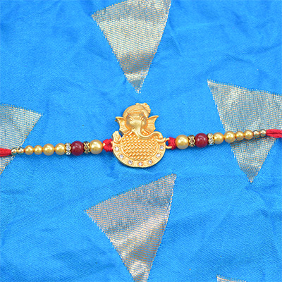 golden Ganesha Rakhi with Multicolor Pearls