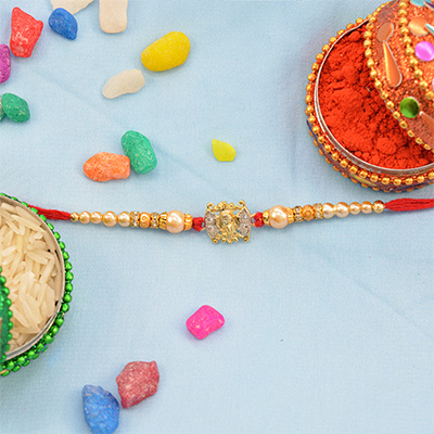 Beautiful Combination of Gold and Silver Rakhi with Pearls