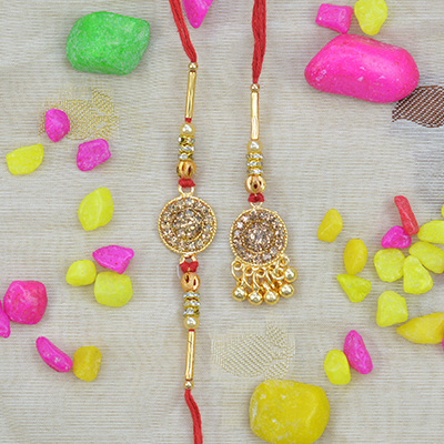 Pleasing Golden Color Jewel Studded Beaded Bhaiya Bhabhi Rakhi Set