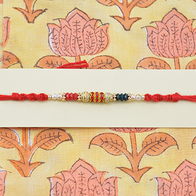 Red, White and Black Color Beads with Red Jewel Rakhi