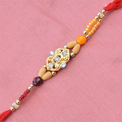 Golden Color Rakhi With Sandalwood Beads 