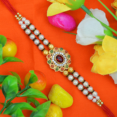 Glorious and Amazing White and Golden Color Beads Rakhi for Brother