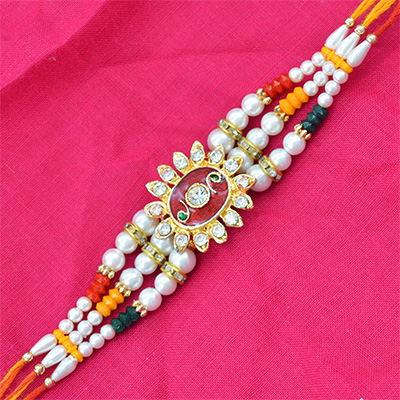 Golden Floral type Diamond Beads Rakhi for Brother