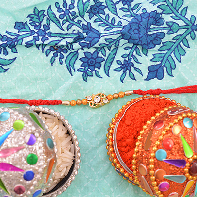 Three Jewel in the Middle on Beads Rakhi 