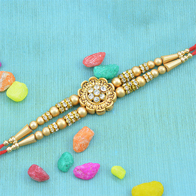 Stunning looking Floral Shaped Golden Beads Rakhi