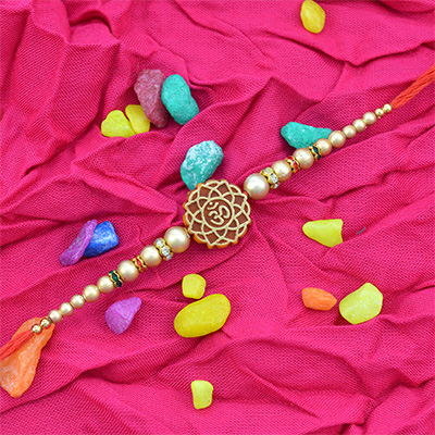 Sacred Om Rakhi with Multiple Beads and Jewels