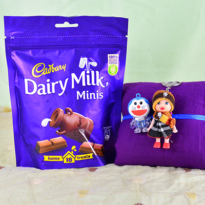 1 Doll 1 Doremon Rakhis with Cadbury Dairy Milk Minis