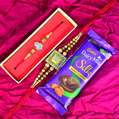 2 Golden Beaded Brother Rakhis with Dairy Milk Roasted Almonds