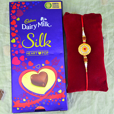 Dairy Milk Silk Heart Pop Chocolate with Coin Shape Golden Rakhi for Brother