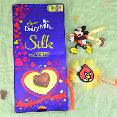 2 Cartoon Kid Rakhis with Dairy Milk Silk Heart Pop Chocolate