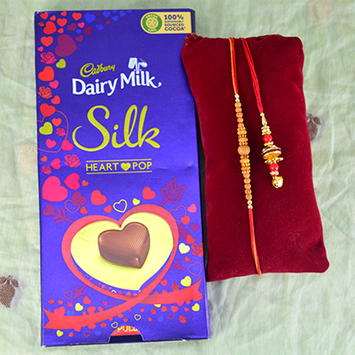 Sandalwood Bhai Rakhi with Bhabhi Rakhi with Chocolate Silk Heart Pop Chocolate