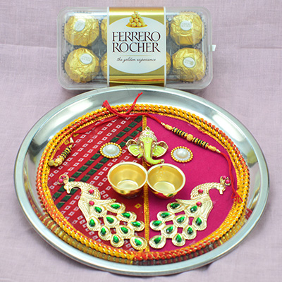 16 Pc Ferrero Rocher Chocolates and Ganesha Studded Rakhi Puja Thali Hamper