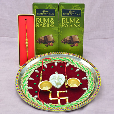 2 Cadbury Rum Raisins with Sacred Swastika Auspicious Rakhi Pooja Thali